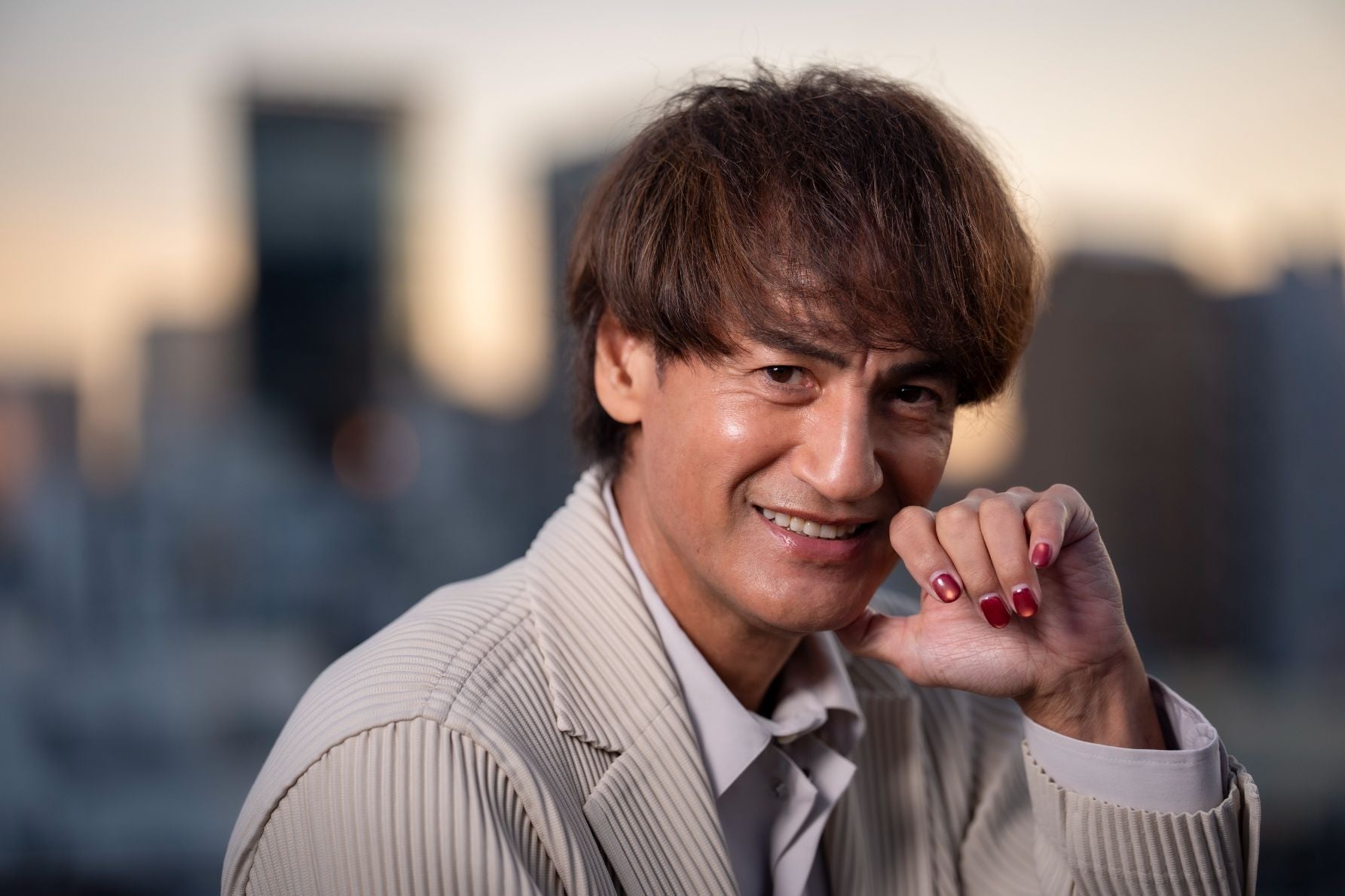 Jリーグの黎明期を支えた本並健治。現役時代と現在のクルマ選びの変遷を語る表情。