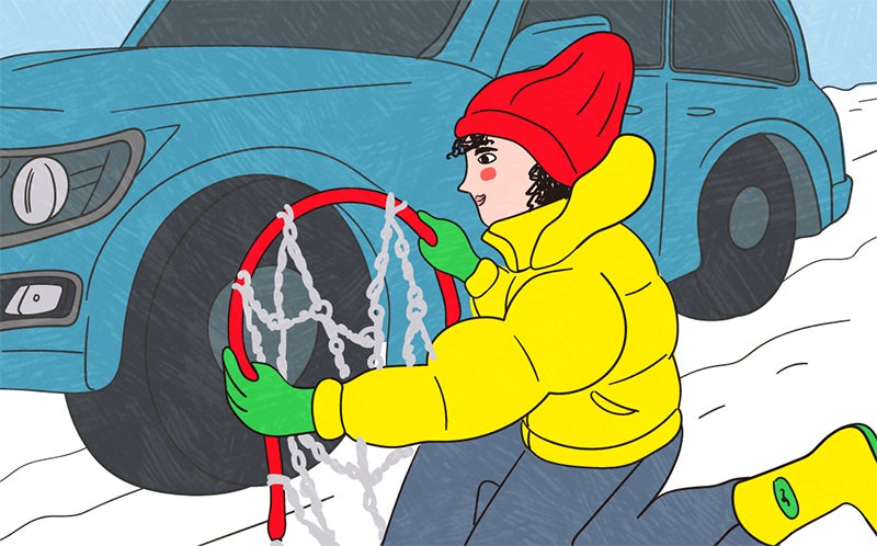 タイヤチェーンを装着する様子