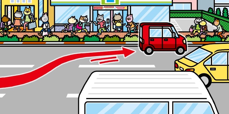 縁石に黄色い破線がある道路に駐車するクルマ
